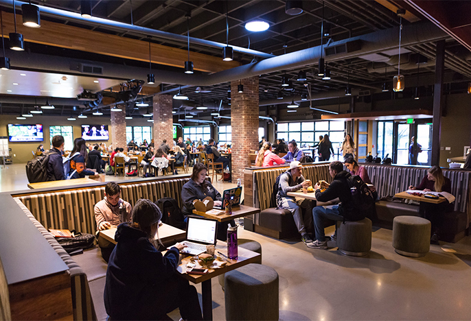 Wide shot of the interior of the Pilot House showing both the lounge and main dining area.