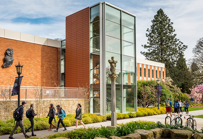 Students walking outside library